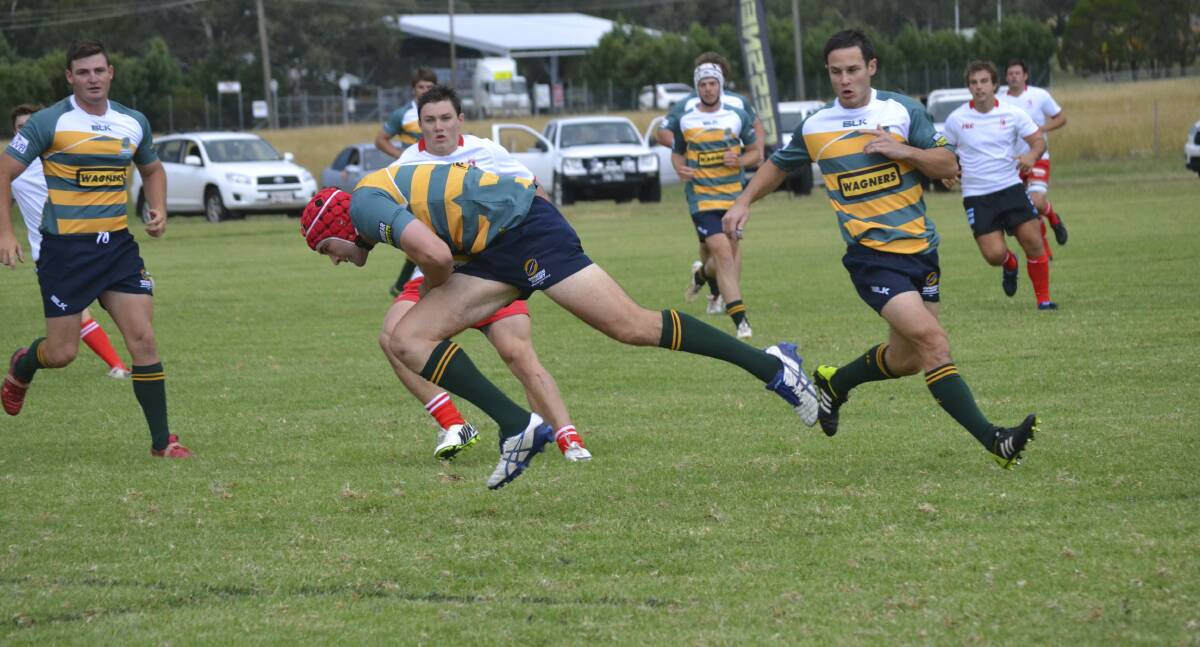 SPEEDSTER: Central North’s Soni Halanukonuka makes a break and attacks the Darling Downs line.