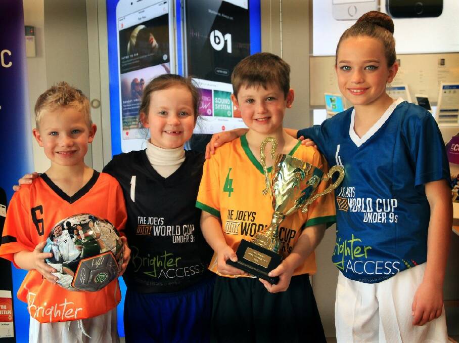 UNDER 9: Players ready and dressed for the Mini World Cup are Oliver Sutton, Millie Kinnear, Noah Pay and Chantal Sutton.
