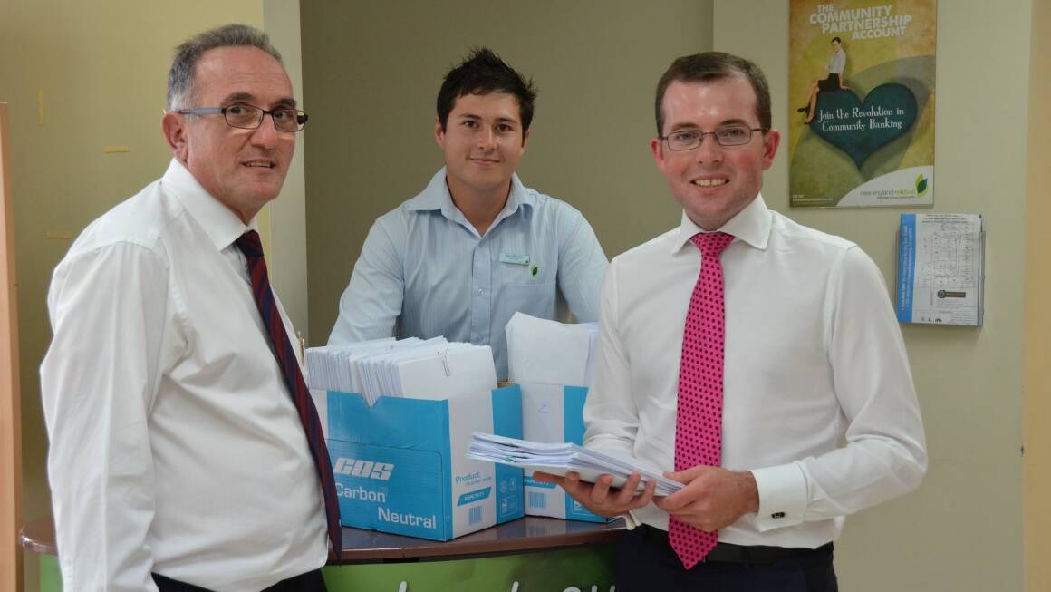 COMMUNITY SUPPORT: Inverell Chamber of Commerce president Anthony Michael with the manager of New England Mutual, Alex Rebeiro, and the member for Northern Tablelands, Adam Marshall, who collected the letters of support for hospital improvements.