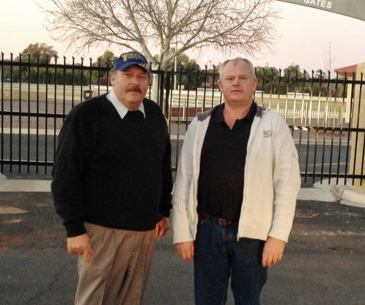 LEAVING: Simon and John Smith in front of Varley Oval where they saw so many juniors learn the game.