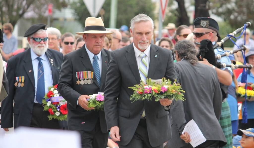 Mayor Paul Harmon for Local government, Senator John Williams for the Australian Senate and Peter Kearsey for the NSW government laid flowers.