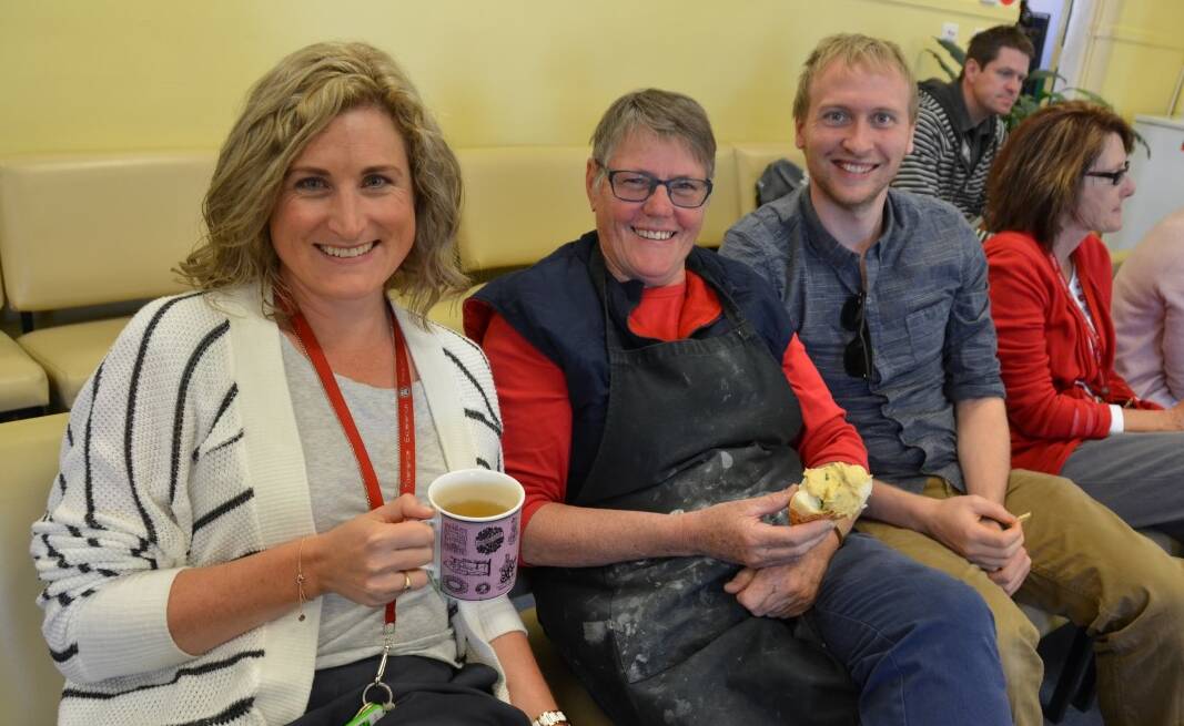 SUPPORTING THE CAUSE: Katrina Richardson, Jackie Hahn and Lachlan Stewart in the staff common room, which was packed with teachers eager to support the Cancer Council and taste the spread.
