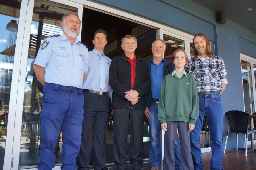 STANDING UP: Local men Ron Halliday, Peter Caddey, Ken Williams, Graham Kerridge and Jesse Atkinson with his father Troy Wallace.