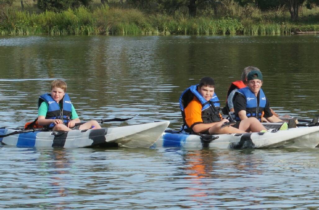 TRAINING: Josh Beeton, Will Ryan and Hayden Roughly have been training twice a week for the Paddle Fest.