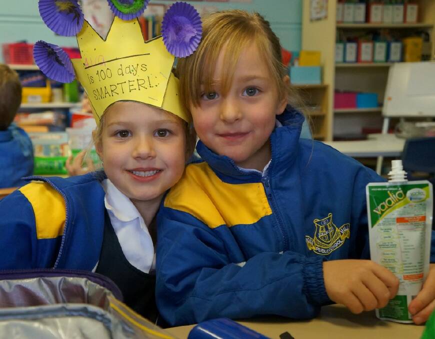 MILESTONE: Ava and Maddison celebrate reaching 100 days at primary school.