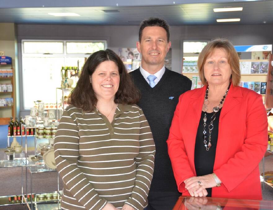 JEWEL IN THE CROWN: Talia Hill, Peter Caddey and Ann Clydsdale at the tourist information centre.