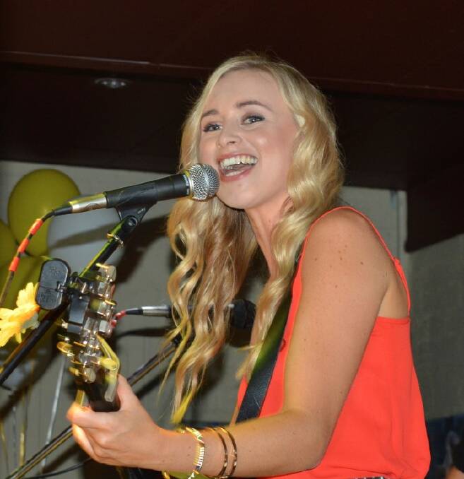 HOMETOWN GIRL: Mel Dyer performs at the local launch of her new EP, Lifetime, on Saturday night at the Union Bar