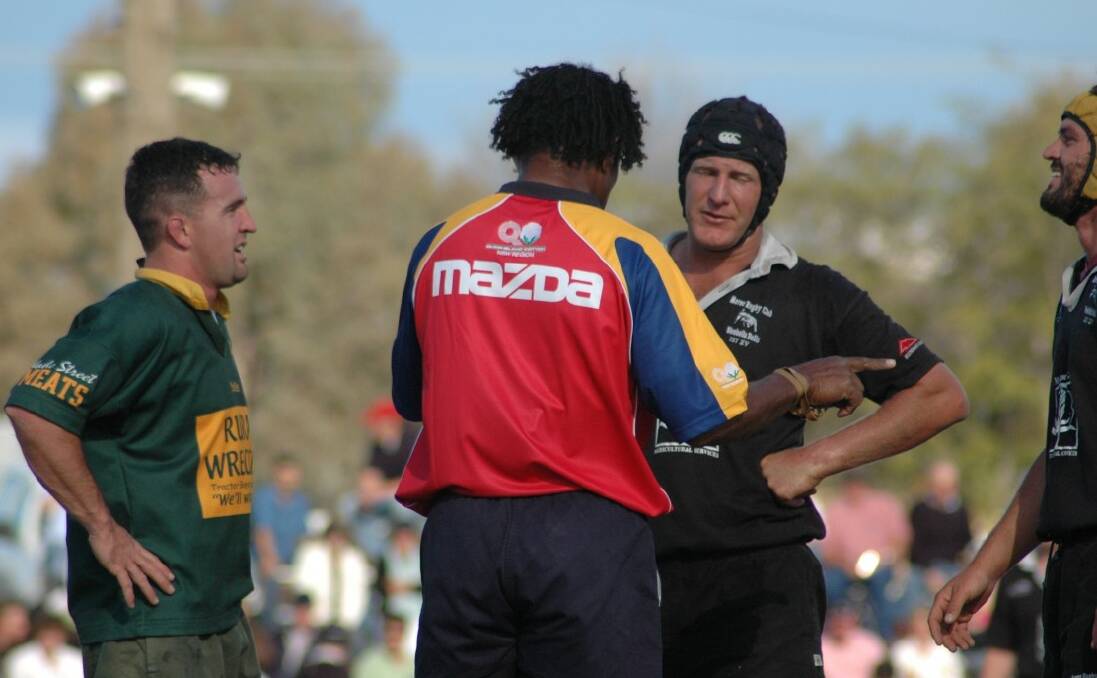 CHAT: Inverell Highlanders' captain Dave Kearsey and his Moree counterpart holding discussions with the referee in 2006, which look to be coming down in Inverell's favour.