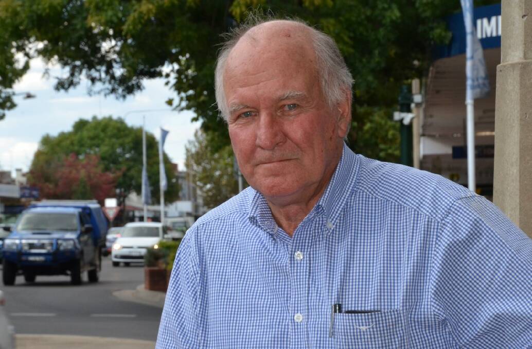 SIGN OF THE TIMES: Tony Windsor said the defacing of signs was normal in an election and on some of his he had grown a beard and on others he had hair.