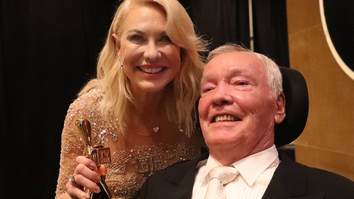 Kerri-Anne Kennerley and her husband John Kennerley pose with the Hall Of Fame Logie Award. Photo: Scott Barbour/Getty Images