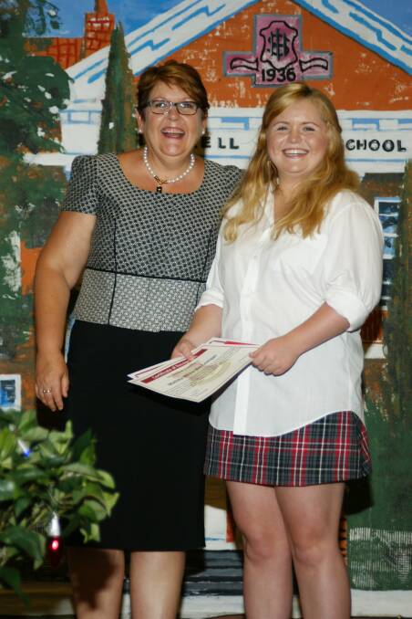 Tilly Witherdin-Costigan with principal Penny Colley.