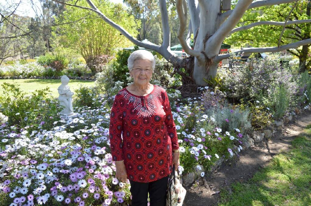 Betty Platford enjoys the Denovans' gardens