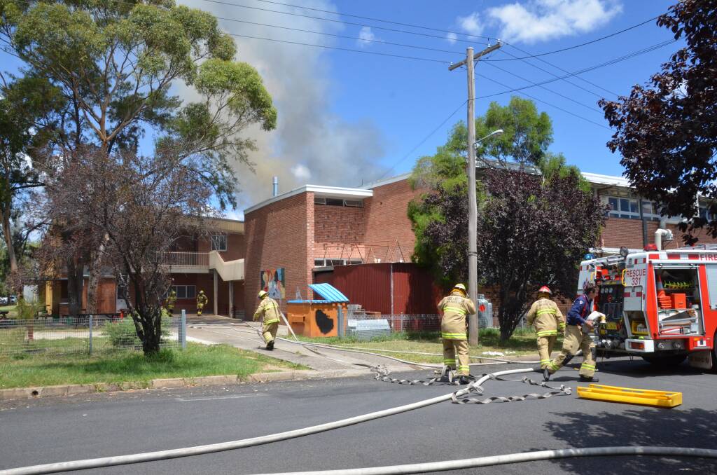 The Inverell High School's industrial arts building was damaged by fire on Wednesday after a nearby tree was set alight.
