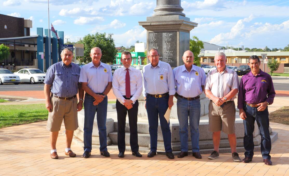 Stuart Berryman, Pat McMahon, Adam Marshall, Graeme Clinch, Mark Hauser, Harold Over and Jacko Ross at the newly paved cenotaph with much more work to come. 