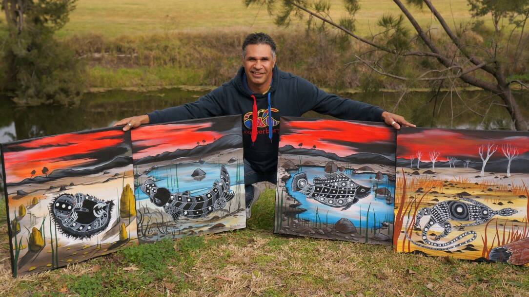 VISION: Dennis Pitt with four recent paintings to be hung in Inverell.