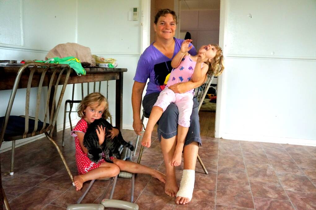 SHATTERED: Sandra Bamberry with her two daughters, Isabel with her cat Rose and her little sister Abby.