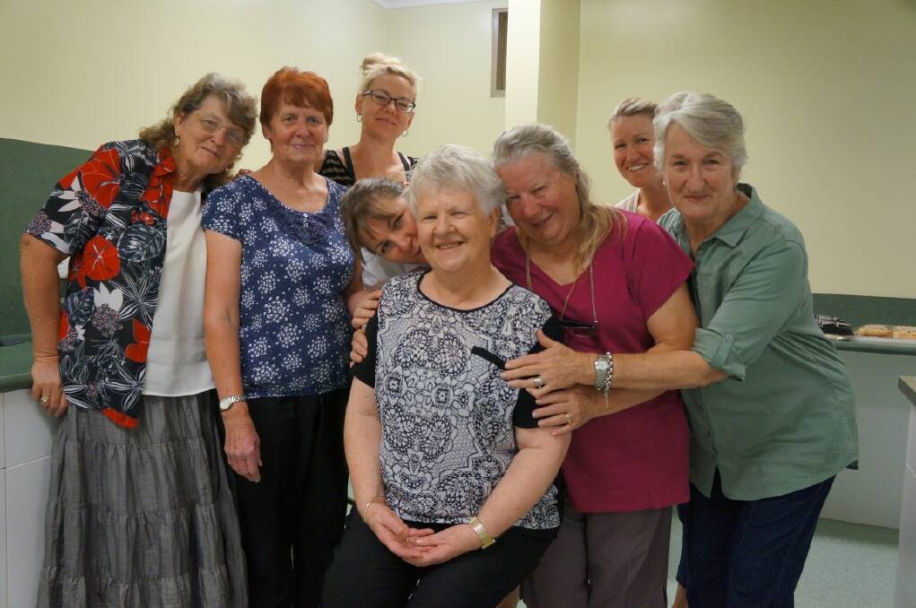 Judy Lynn (seated) surrounded by her loving canteen volunteers Marilyn Flett, Therese Magann, Amanda Cooke, Cathy Schroder, Lorraine Purvis, Angie Walker and Bev Campbell. 