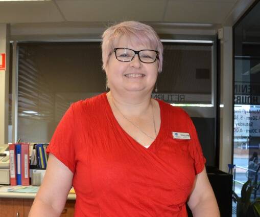Library Manager, Sonya Lange is pleased with the new vending machines.