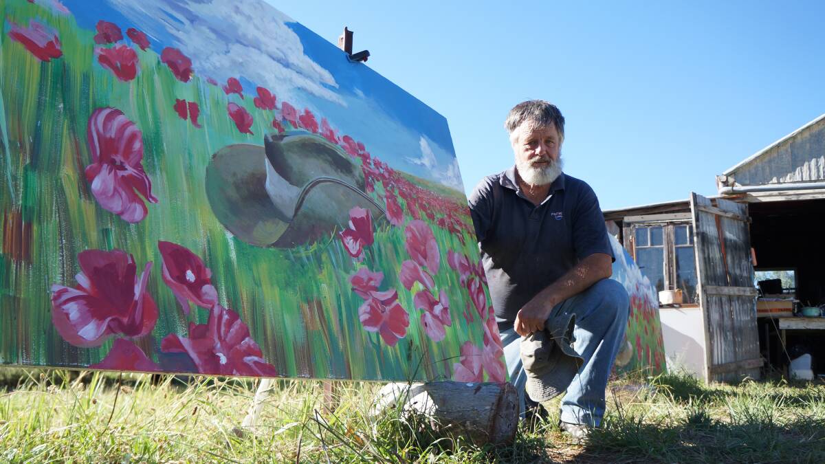 BATTLE INSPIRES ART: Elsmore artist Lindsay Peacock with the unfinished panels that will soon be installed at the archway at Delungra’s Anzac Park.