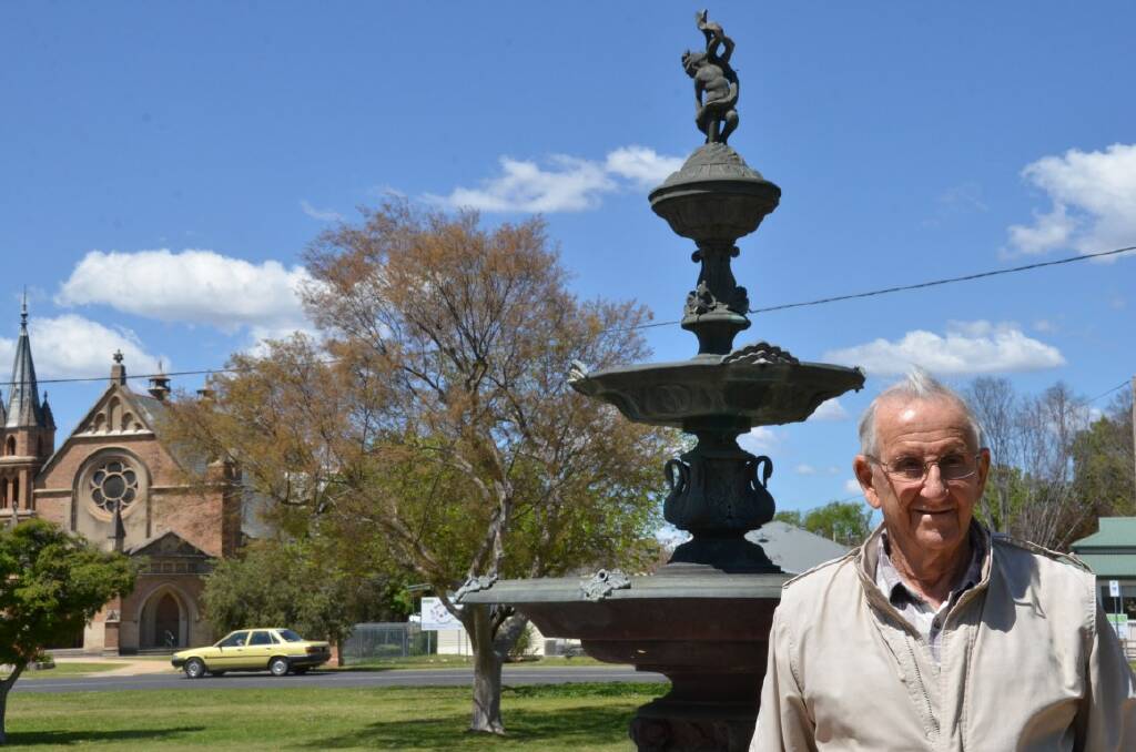 Norm Morris stands where his grandfather’s sunken garden once grew.