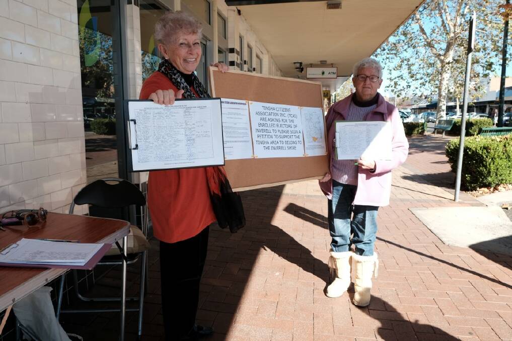 COLLECTING: Tingha Citizens’ Association president Colleen Graham and aide Betty Grant with the TIngha petitions on Wednesday morning.