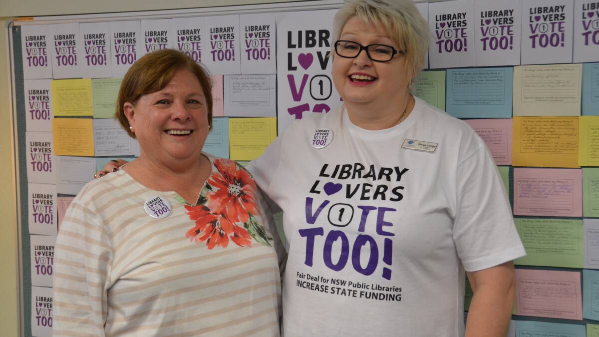 PROTEST: Councillor Di Baker and Inverell Shire Council library manager Sonya Lange at the 'library lovers vote too' table.