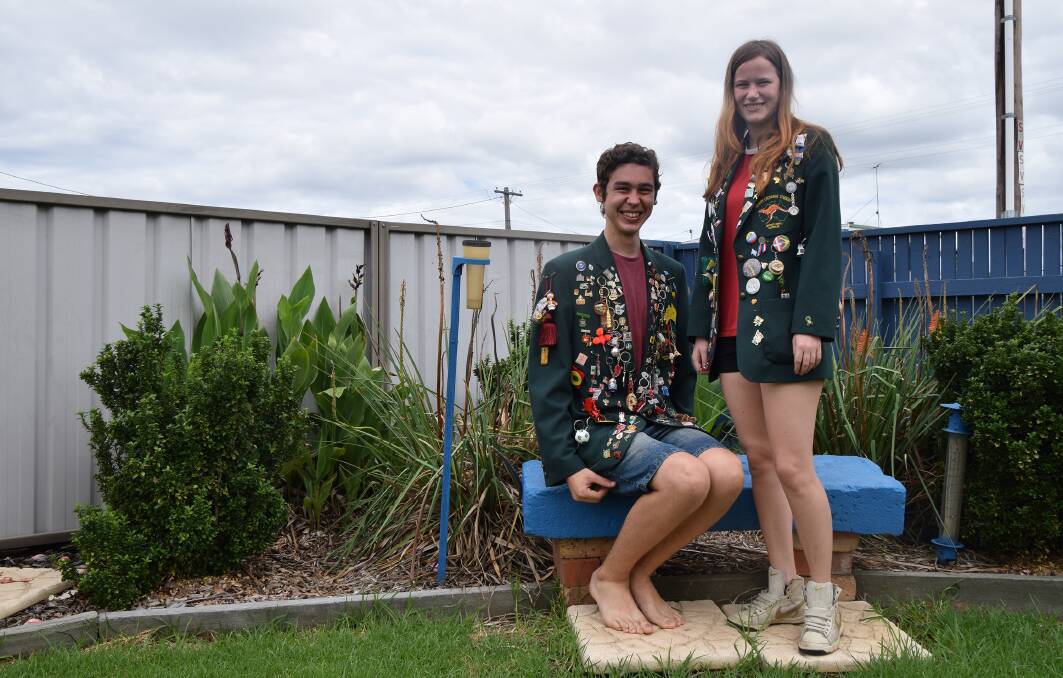 TRAVELLERS: Zac Luxford and Kahlee Traynor-Chilcott with their exchange student jackets.