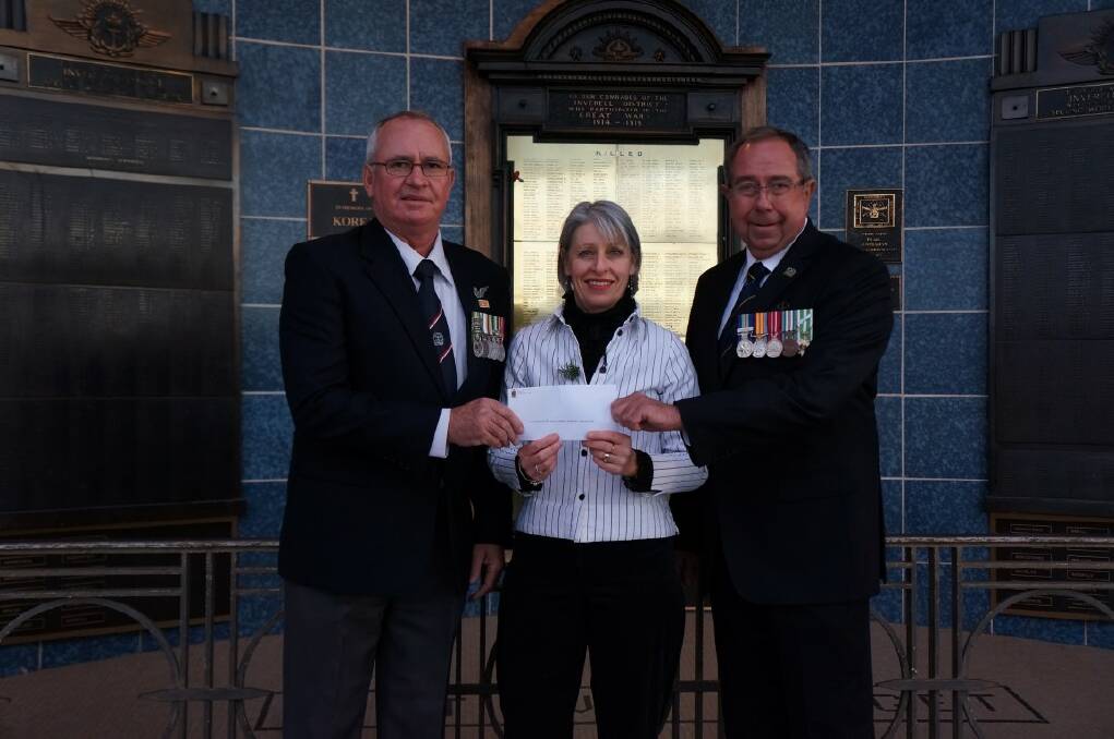 DONATION: committee member Kim Blomfield with RSL sub-branch vice president Patrick McMahon and secretary Graeme Clinch with the $5000 donation.