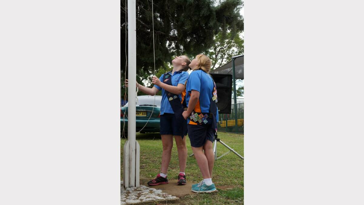 Delungra Girl Guides Tessa Stewart and Emily Johnson were on flag duty. Emily was wearing the medals of her great-grandmother, Constance McInerney (nee Browning). Pic 54