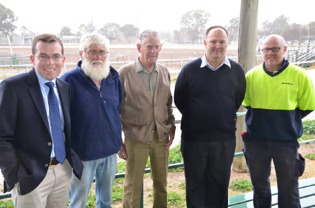 FUNDING: Northern Tablelands MP Adam Marshall at the Inverell Showground with Bruce Turner and Geoff Mather from the Showground Trustee, Inverell Show Society vice president Jodie Burtenshaw and Tane Richardson, president of the Inverell Basketball Association.