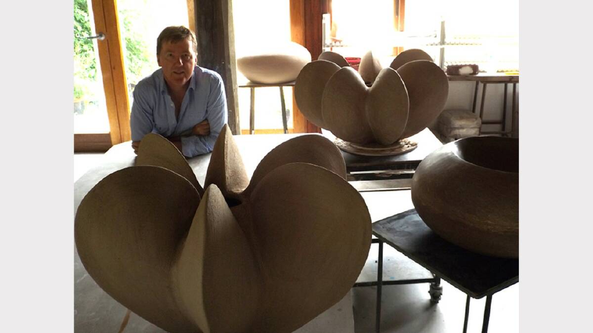 Glen Innes ceramicist Max Powell with some his large sculptural work to be seen at Inverell.