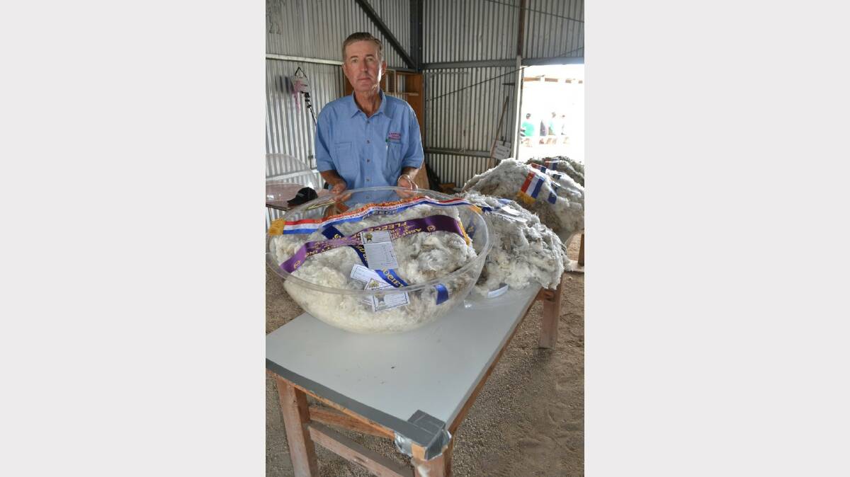 Gilbert Fitzhannim was Chief Steward in the Wool Section, shown here with the Grand Champion Fleece, entered by Julius Grazing.