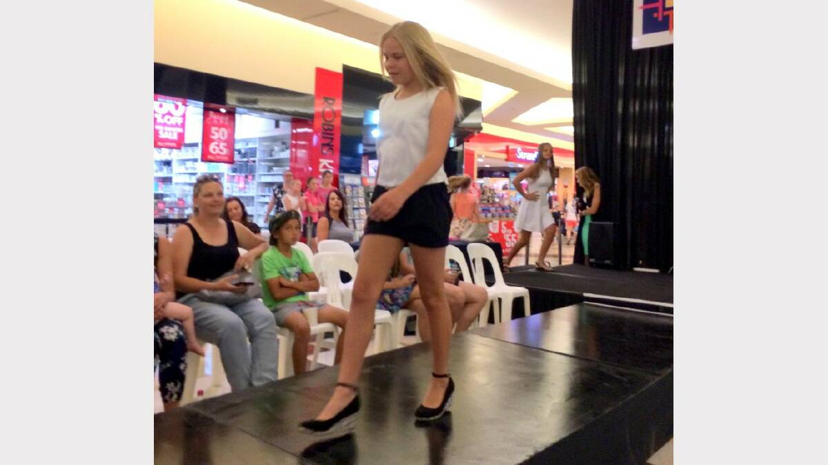 Chloe takes to the catwalk at the regional section of Miss Country Girl Australia competition in Tamworth.