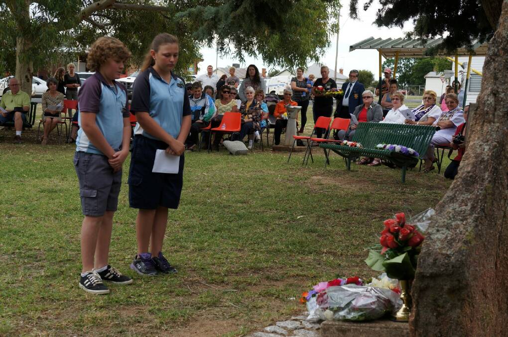 Mitchell and Tessa Stewart took a moment of reflection after they read a poem about a fallen soldier and laid their wreath for Delungra Public School. Pic 67