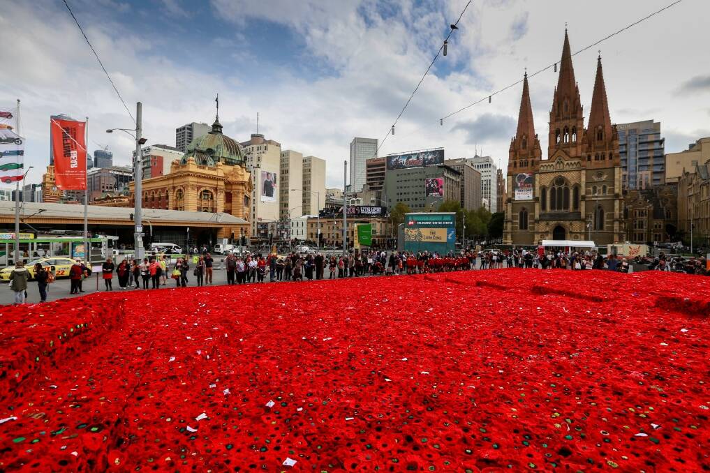 The poppy carpet at the Federation Square community tribute to ANZAC day. Photo by Eddie Jim, The Age NEWS
