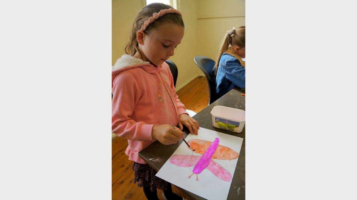 Amelia Harris-Carter was painting a butterfly.