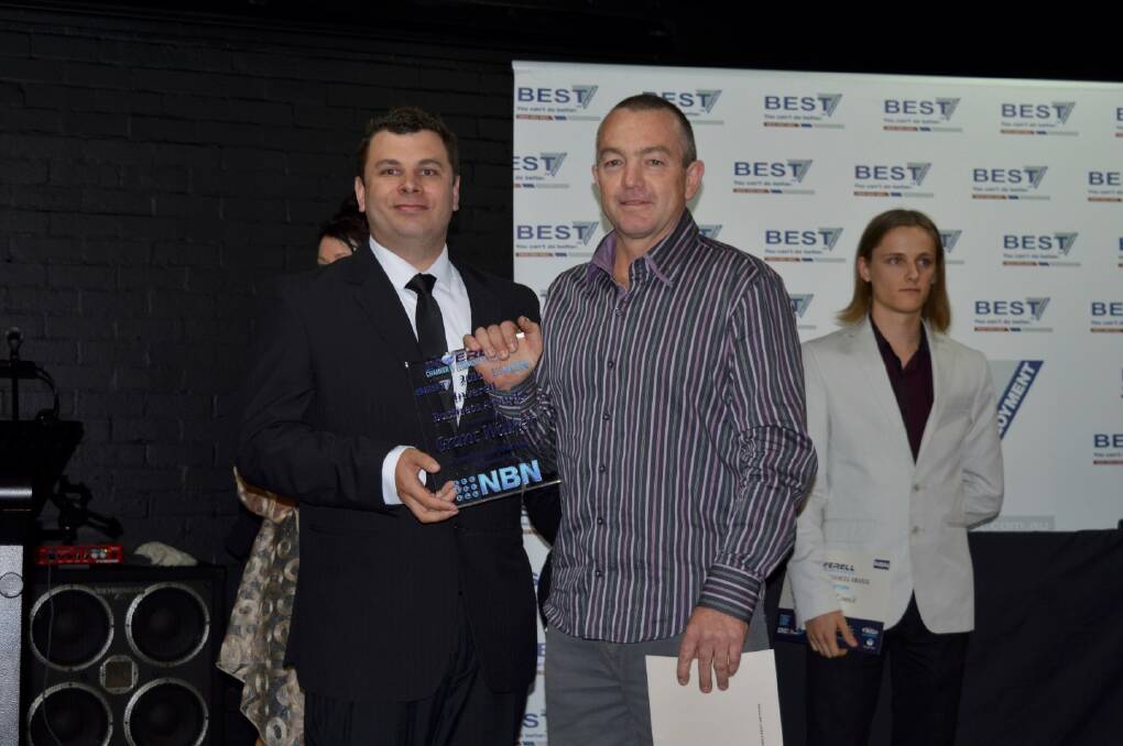HIGH PRAISE: Michael Ryan presents the Best Employee of the Year award to Dieselequip’s Grant Walker.