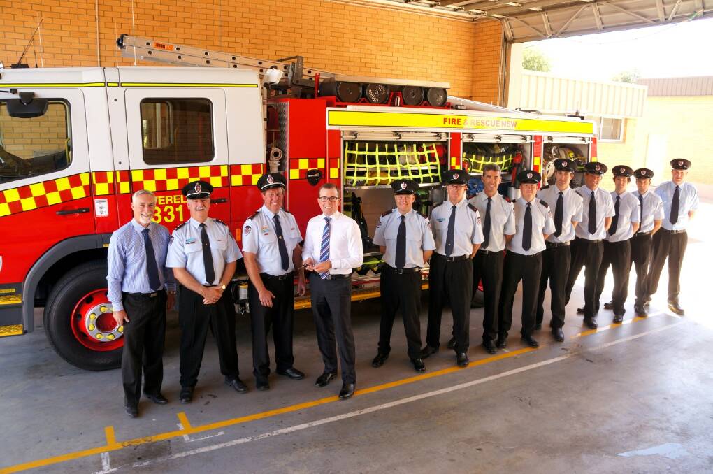 NEW MOTOR: Inverell mayor Paul Harmon, Inverell Station NSW Fore and Rescue Officer Mark Savage, Captain Robbie Wighton, Northern Tablelands MP Adam Marshall, and volunteers Brendan Simpson, Jeff Cowley, Peter del Santo, Russell Brien, Joe Kimmince, Michael Murphy, Matthew Lane, Colin Swansborough and Sam Kimmince.