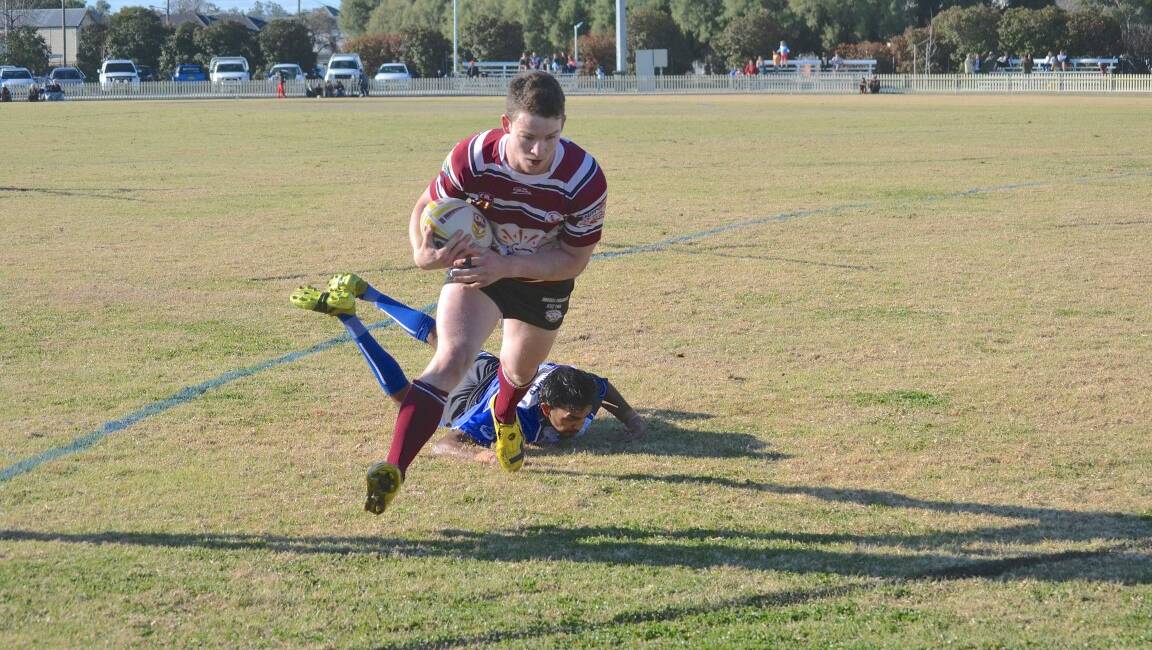 SCORE: Brayden Sunderland heads for the tryline in Saturday’s match against the Moree Boars.