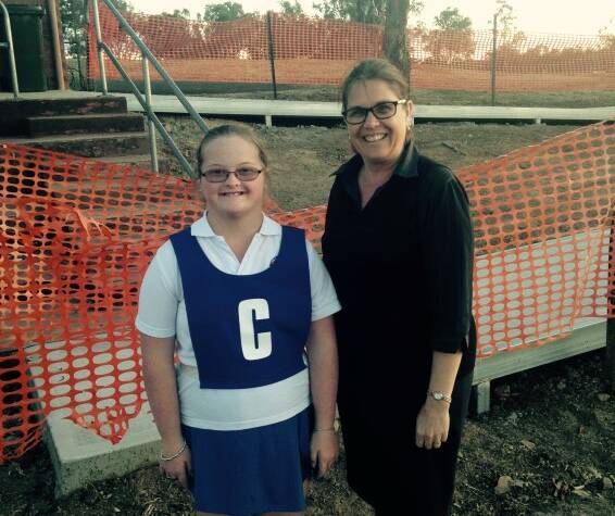 Netball player Emi Campbell and Inverell Netball Association president Ange Driscoll near the new access ramp.