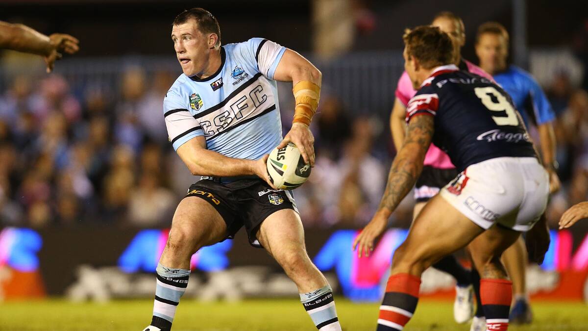 Paul Gallen of the Sharks looks to pass during the round seven NRL match between the Cronulla-Sutherland Sharks and the Sydney Roosters at Remondis Stadium on April 19, 2014 in Sydney, Australia. Photo: Mark Nolan/Getty Images.