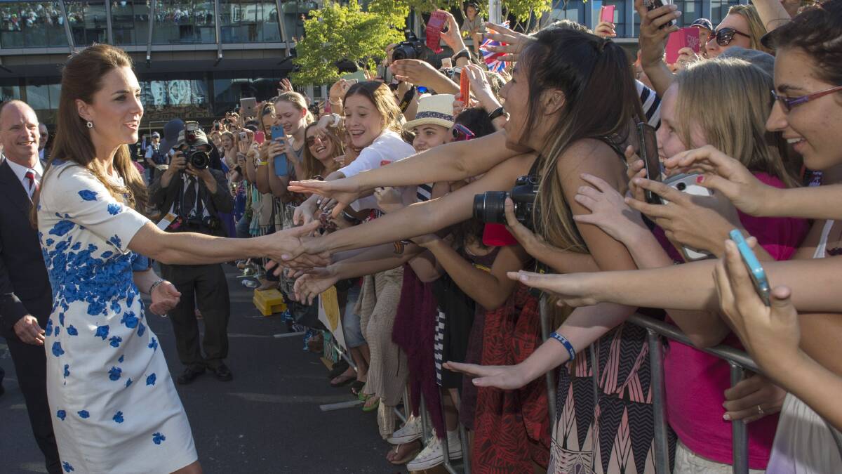 Catherine, Duchess of Cambridge meets well wishers during a walkabout on April 19, 2014 in Brisbane, Australia. The Duke and Duchess of Cambridge are on a three-week tour of Australia and New Zealand. Photo: Arthur Edwards - Pool/Getty Images.