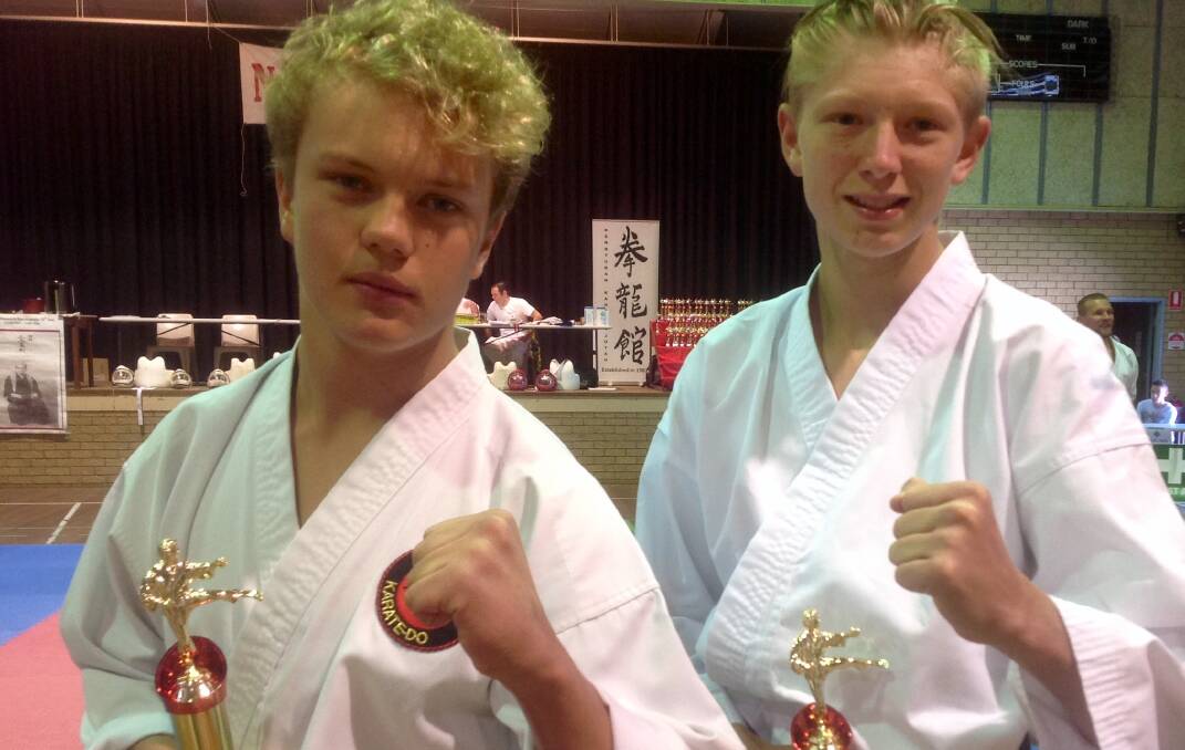 Edmund Bourke, Chaffey's Black Belt Academy, 1st place and Jesse James Kerrigan, Inverell Jin Rhu Kan Club 2nd place in the 14-15 years kata.