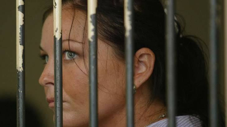 Schapelle Corby behind bars at Bali's Magistrates Court on April 28, 2005 after being caught at Denpasar Airport with 4.1 kilograms of marijuana in her boogie board bag. Photo: Jason South