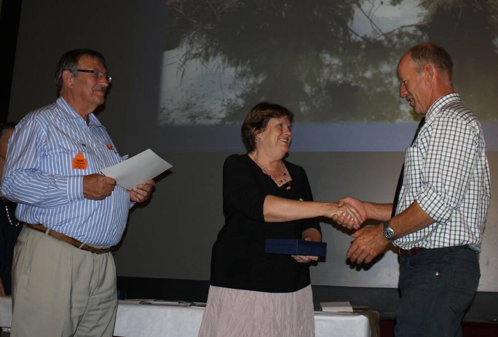 AWARD: David Worsley received his Innovative Primary Producer Award from CMA chairman Hans Heitbrink  and Anne Williams,  Farming Woman of the Year for 2012.