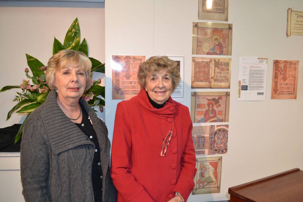 Frances Nicholls and Joan Newhook in front of copies of the Lindisfarne Scrolls. The Scrolls originated in Durham and the exhibitions happen to coincide with the Scrolls' temporary return to their place of origin. The usually reside at the British Museum.