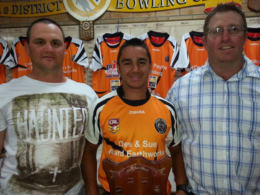 Jayden Connors (centre) who received the Des and Sue Ward Junior Player of the Year award stands with coaches Scott Fitzgerald and Tom Taber.