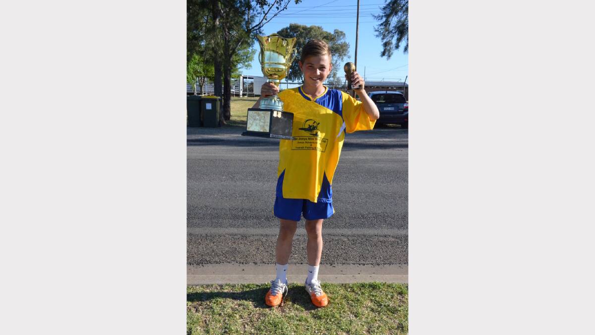 Called 'The Pocket Rocket', Toowoomba Grammar under 14 player Josh Fanning carries the team torphy. Josh also won 'Player of the Tournament' for his division and will be headed to Germany to train.