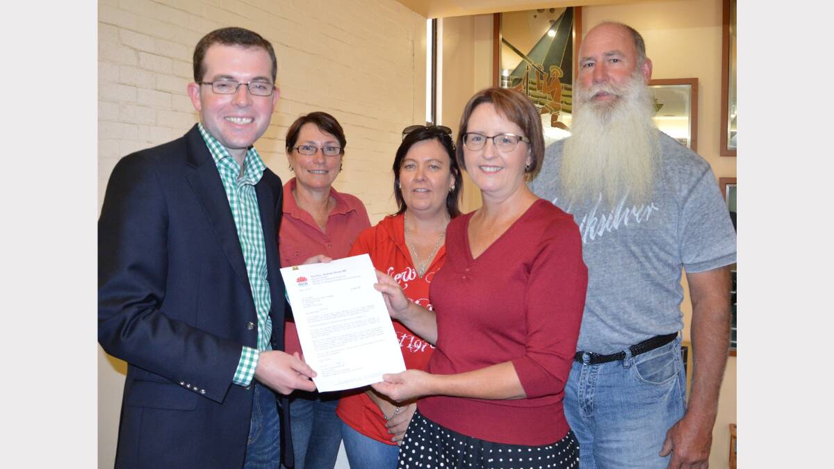 Mount Russell Community Hall Committee members Maryanne Graham, left, Tania Spinks, Katrina Finney and John Finney are pictured with Member for Northern Tablelands Adam Marshall. The Committee will receive $25,000 to weatherproof the Mt Russell Hall and repair the roof.