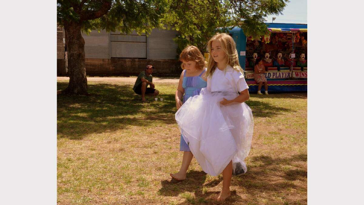 Girl Guides Breanna Johnson and Chelsea Raw were barefoot but beautifully dressed at the Delungra celebration.